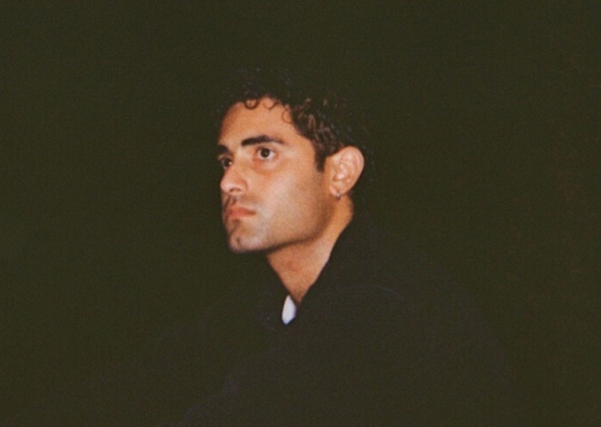 Ashley Singh looking into the distance.x